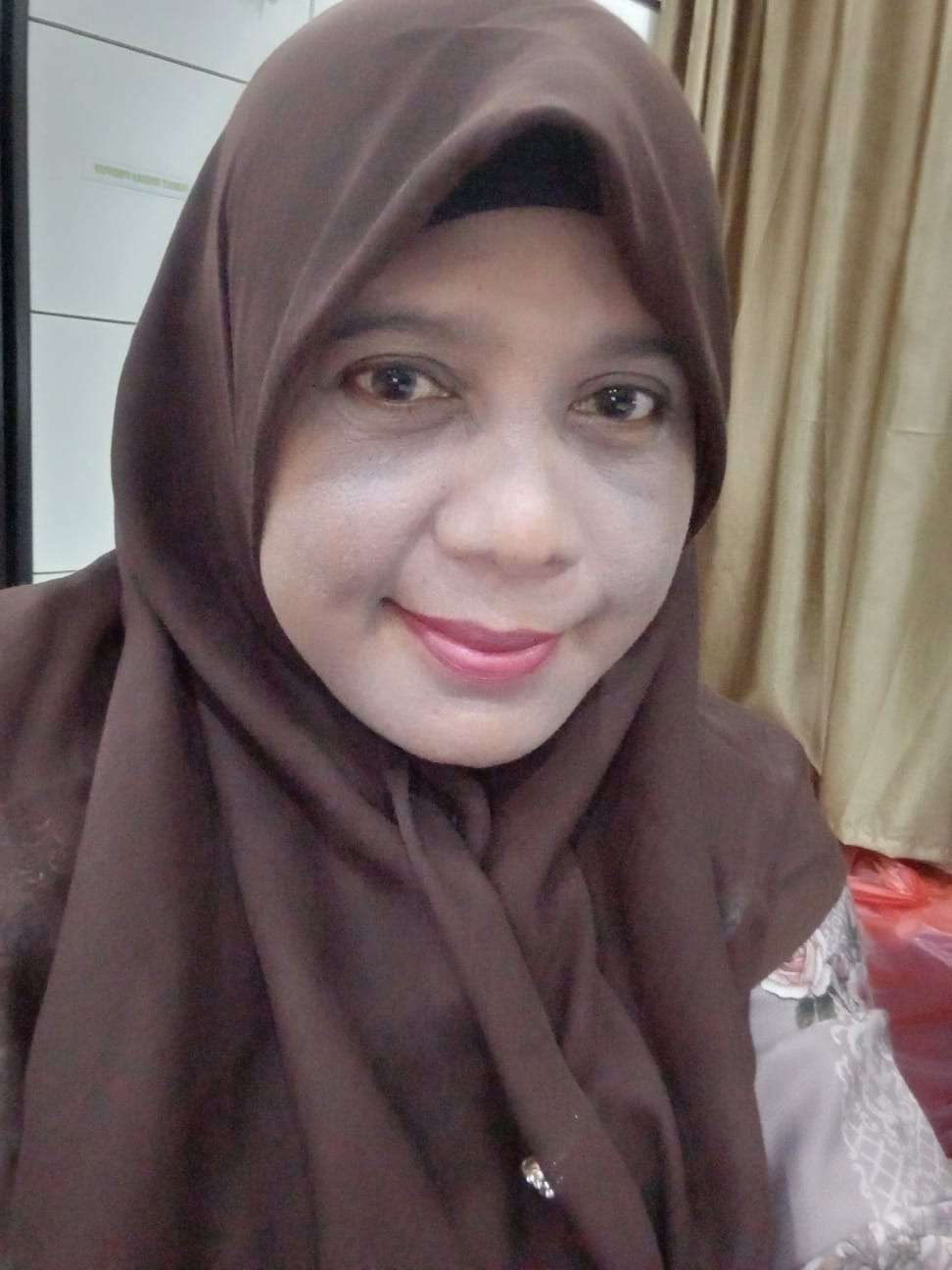 Asrina, S.Pd